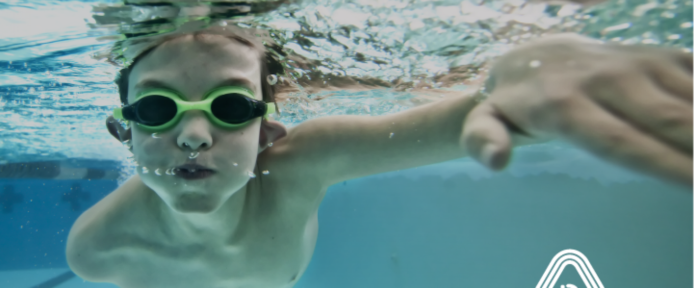 Young boy swimming