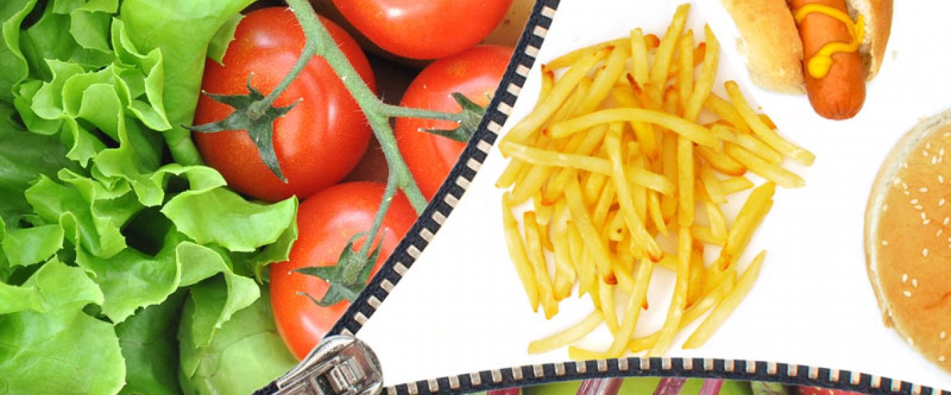 Fruit and veg being unzipped to reveal junk food