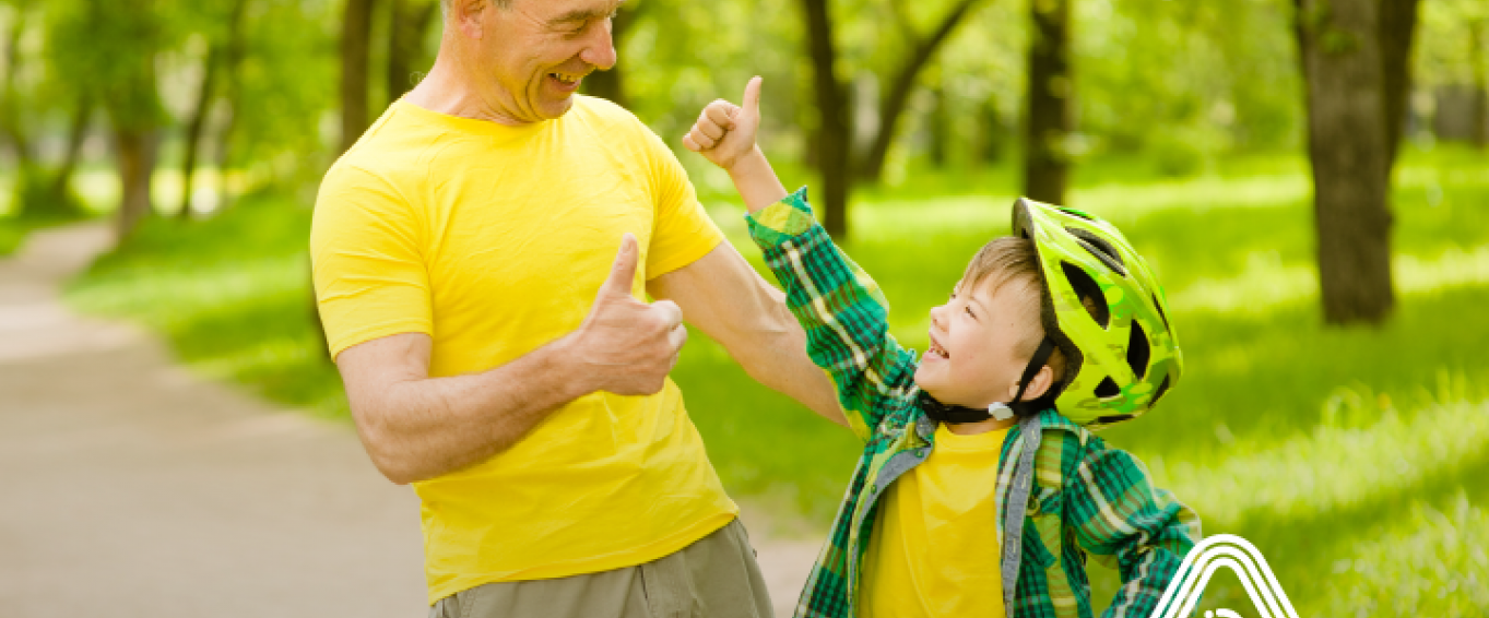 Older man and young boy with bike 