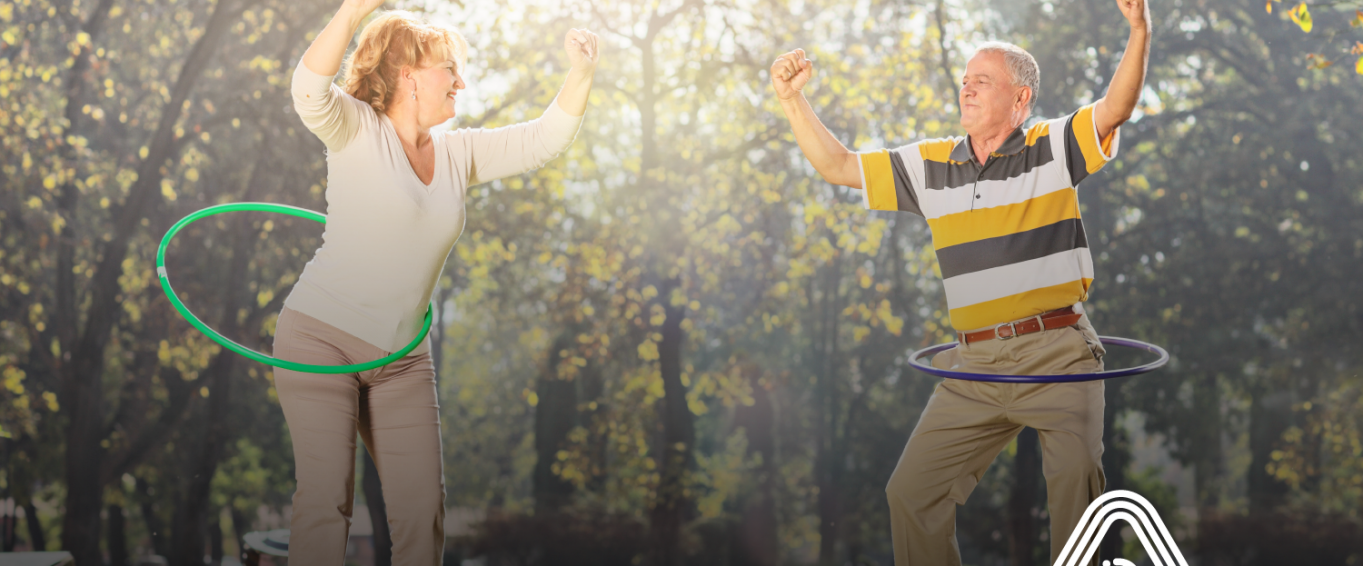 adults doing hula hoop