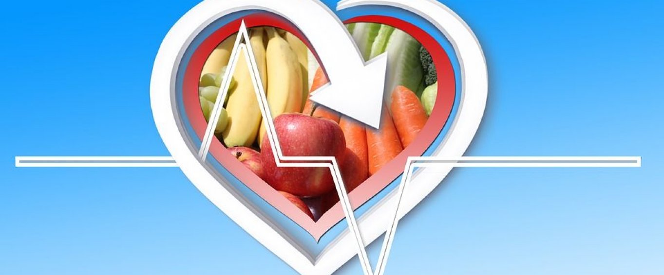 Heart logo with fruit in the centre blue background