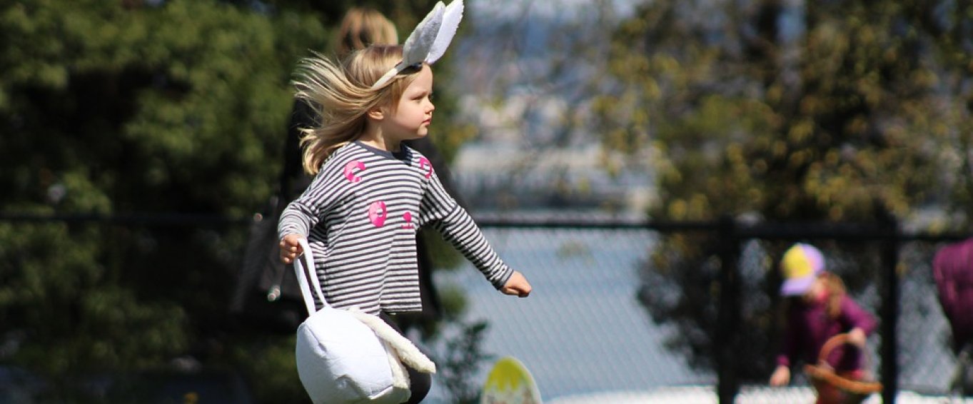 Little Girl with Bunny Ears and an Easter Basket