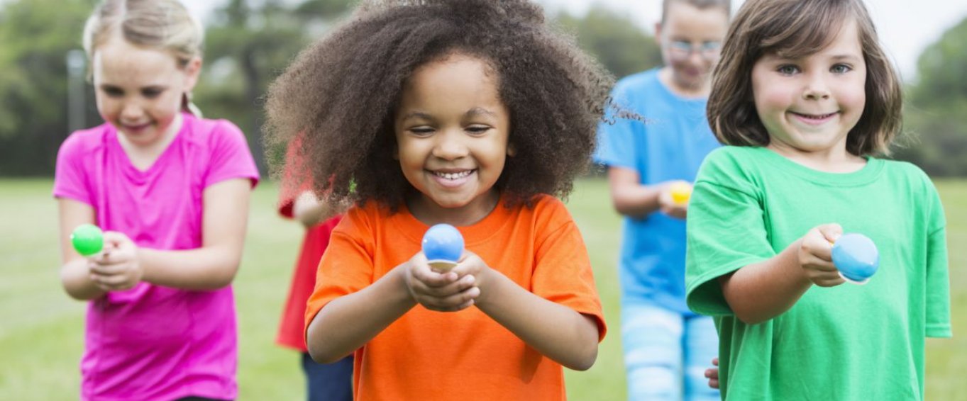 Children Doing an Egg and Spoon Race Children Doing an Egg and Spoon Race