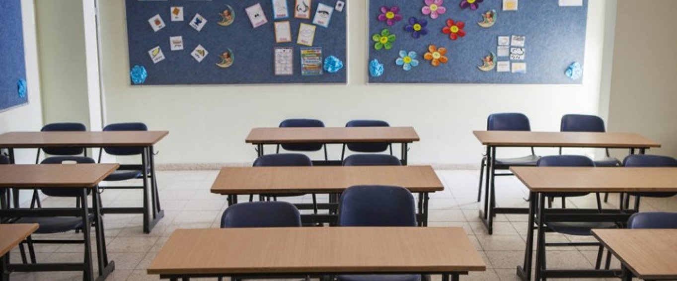 Empty Desks in Rows in a Classroom Empty Desks in Rows in a Classroom