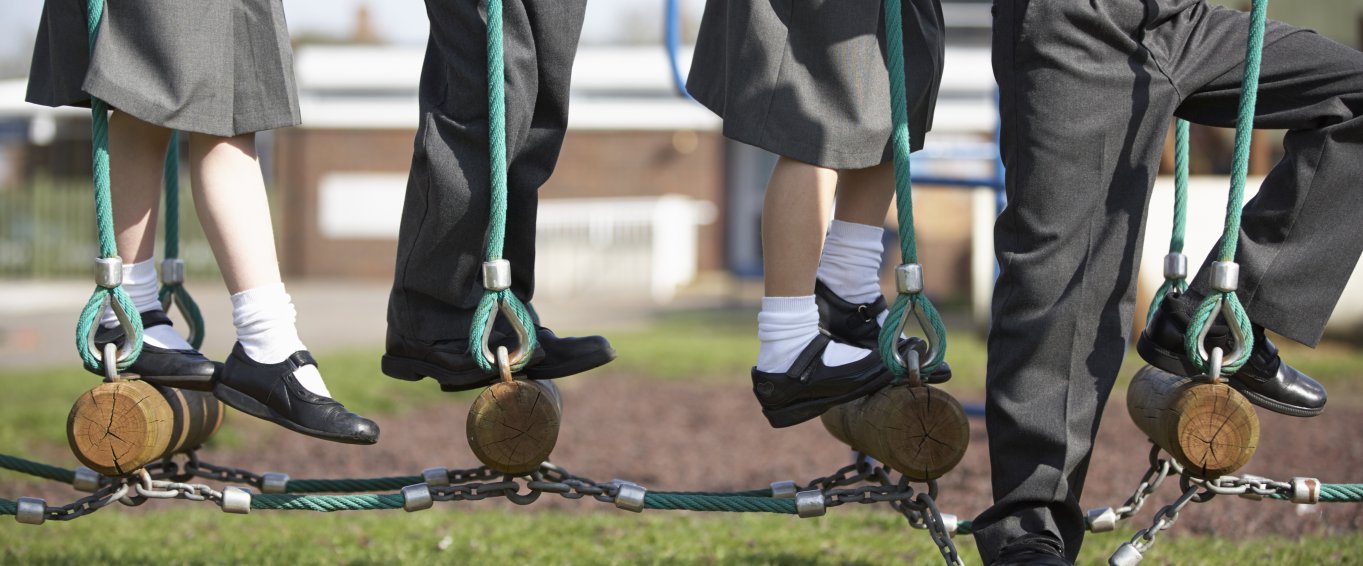 Four children in a playground