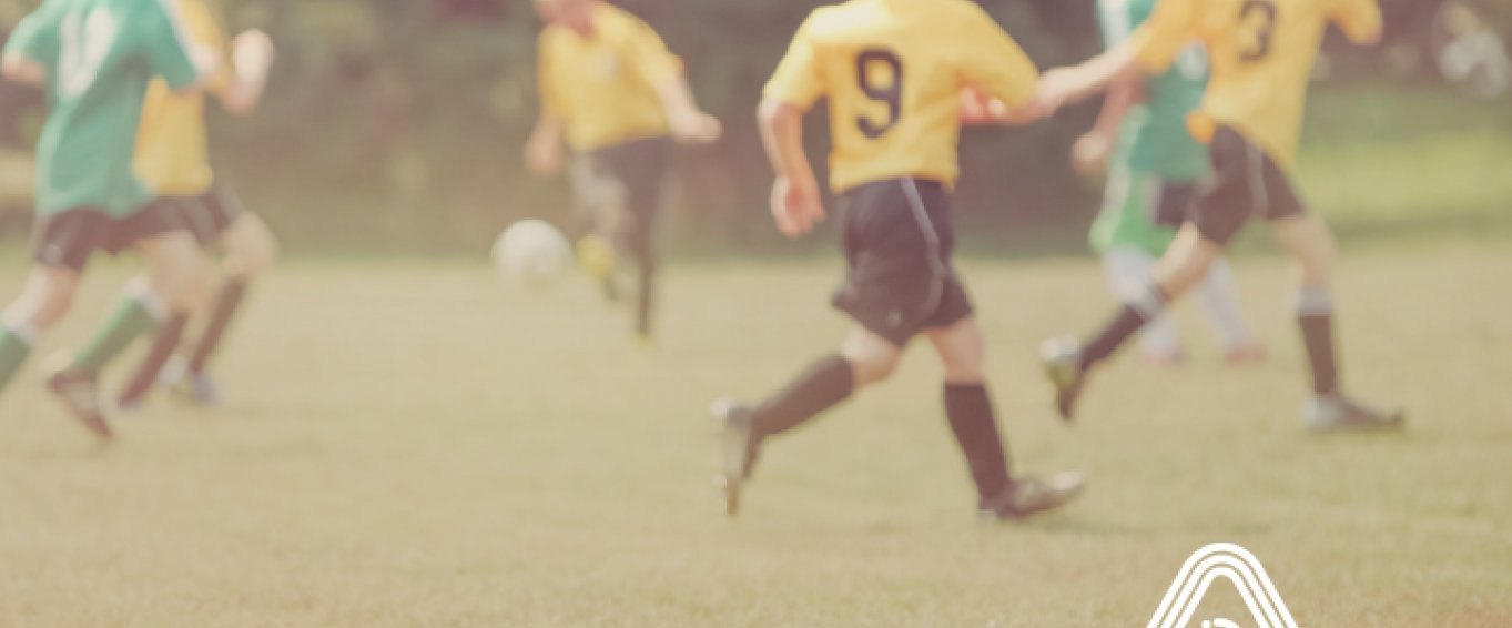 Kids playing football