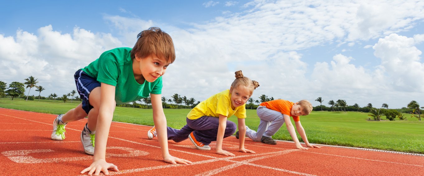 children getting ready to run on track