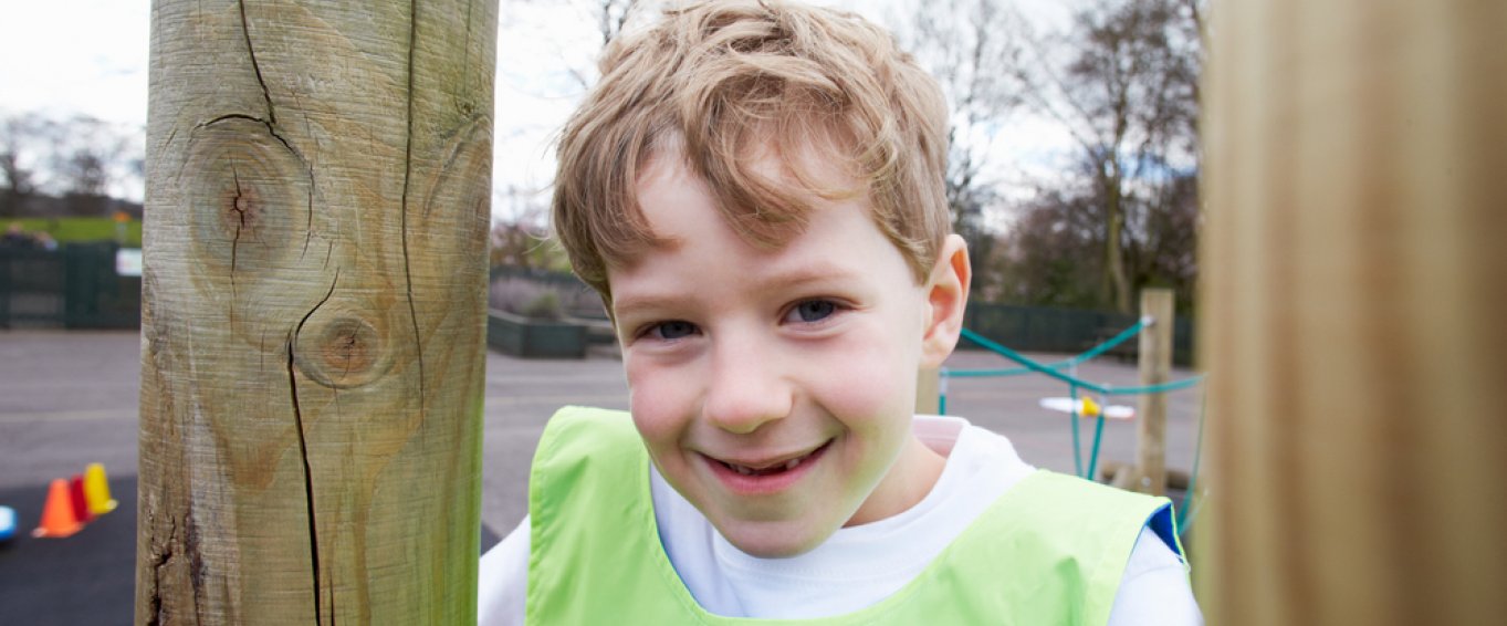 Child in school learning about P.E Child in school learning about P.E