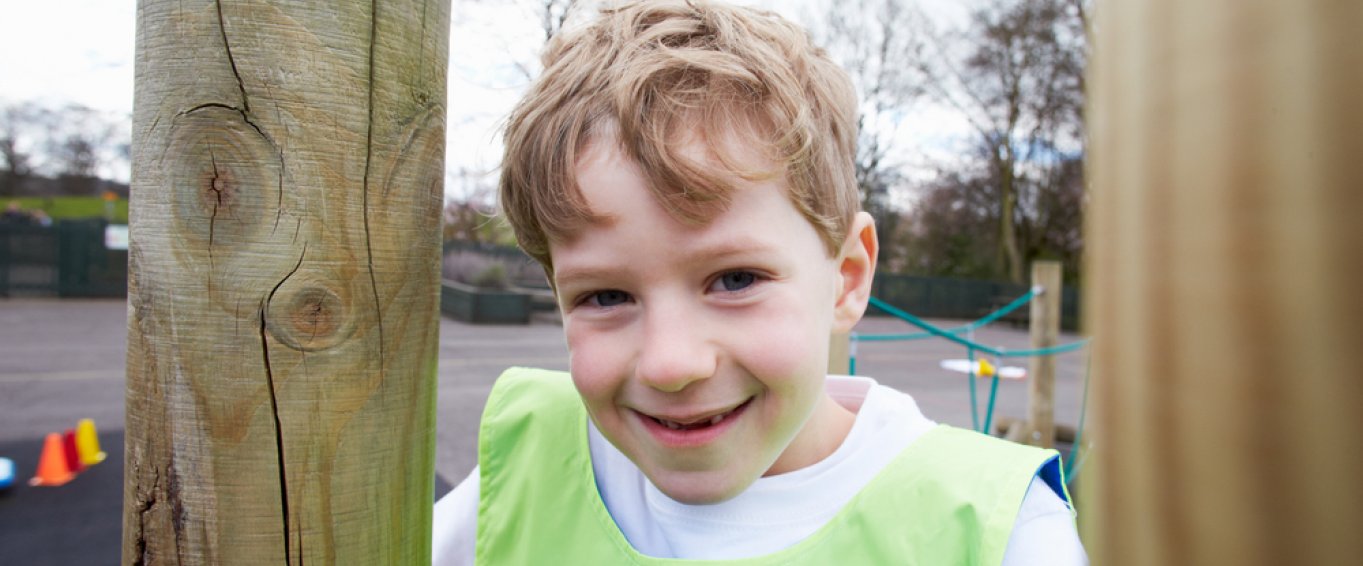 Child in school learning about P.E 