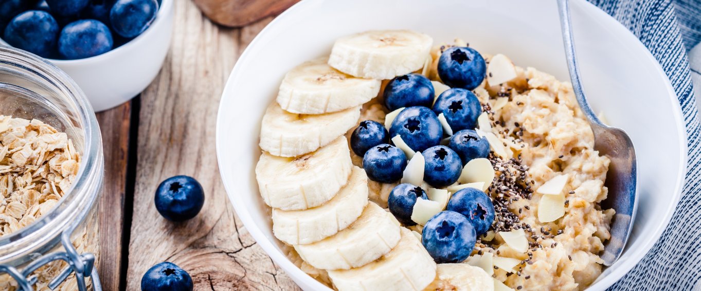 Bowl of porridge with blueberries and banana