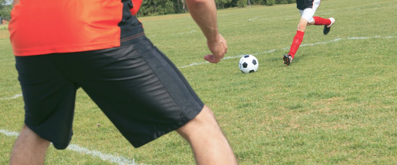 Boys playing football