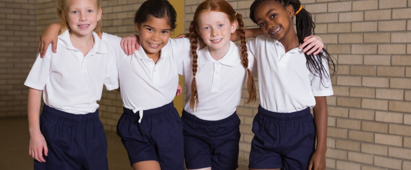 Four Young Girls Posing in School PE Kit