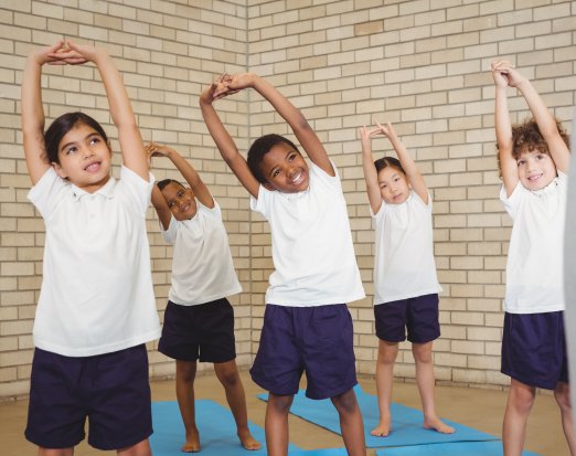 Young Kids Performing a Stretch 