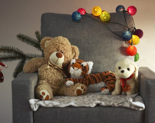 Armchair with stuffed toys and Christmas decorations
