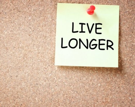 Post it note with 'live longer' written on