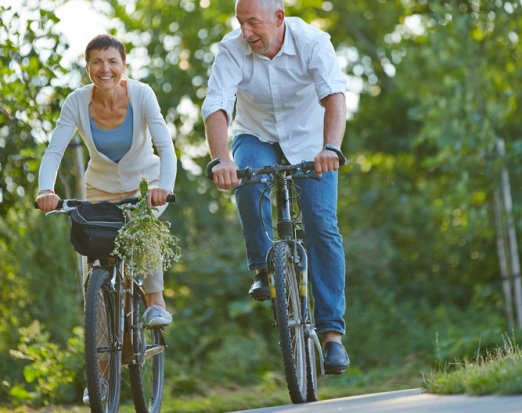 Middle aged people riding bicycles
