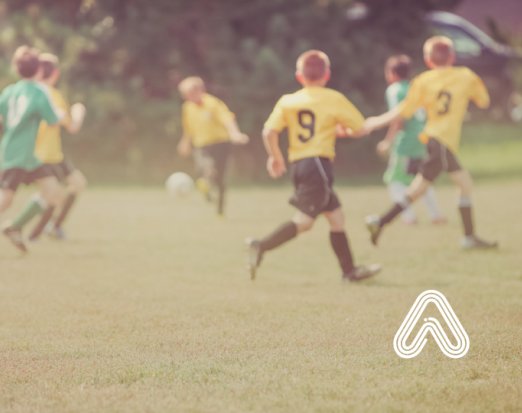 Kids playing football
