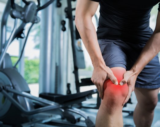 Man with knee doms