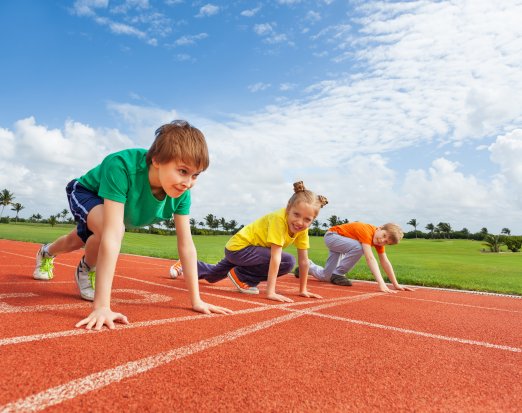 children getting ready to run on track