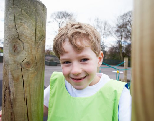 Child in school learning about P.E 