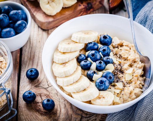 Bowl of porridge with blueberries and banana