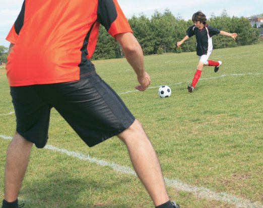 Boys playing football