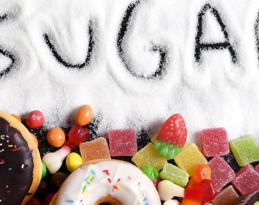 The Word Sugar Written In Granulated Sugar