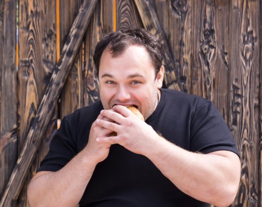 Man eating hamburger