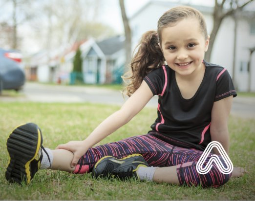 Young girl sat outside sports