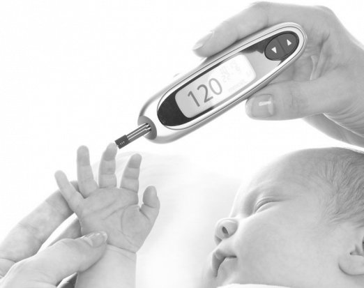 Baby being tested with a thermometer