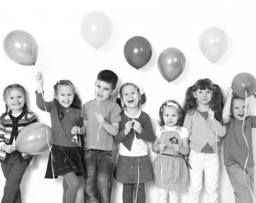 7 Children Holding Colourful Balloons