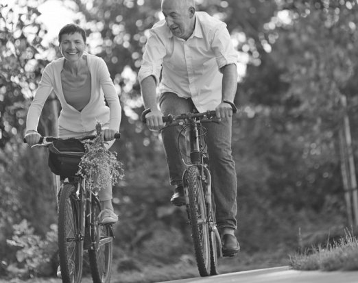Middle aged people riding bicycles