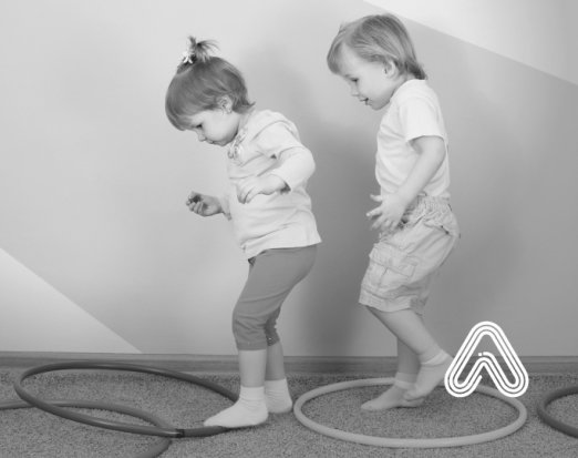 Kids playing with hula hoops fundamental movement skills