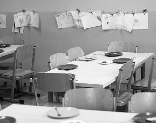 School Dining Hall with Plates Set for Lunch