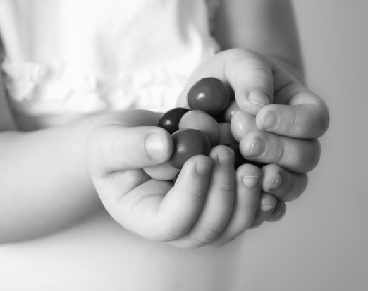 Child holding sweeties