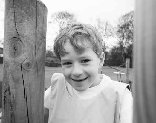 Child in school learning about P.E 