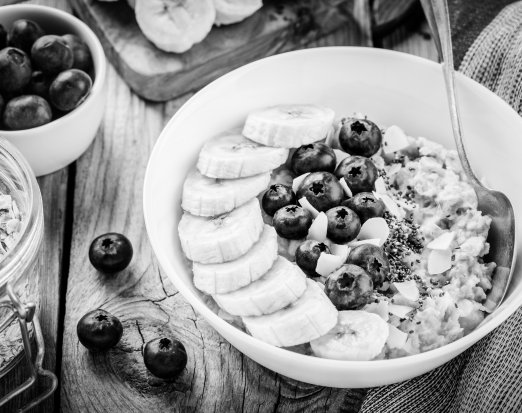 Bowl of porridge with blueberries and banana