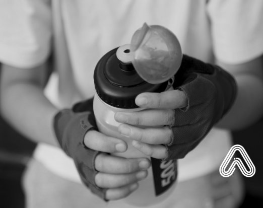 boy holding water bottle