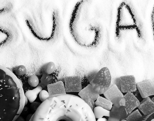 The Word Sugar Written In Granulated Sugar