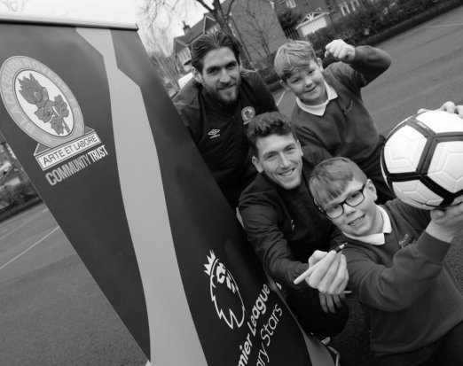 Two Blackburn Rovers Football Players Posing with Three Schoolkids 